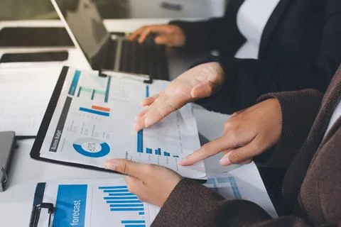 Accountants processing financial documents and taxes, managing corporate fi.. Stock Photos