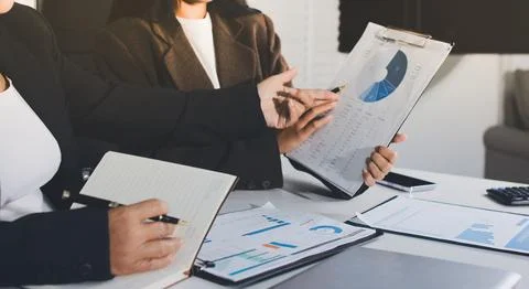 Accountants processing financial documents and taxes, managing corporate fi.. Stock Photos