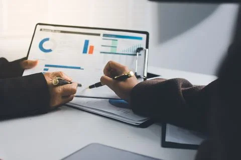 Accountants processing financial documents and taxes, managing corporate fi.. Stock Photos