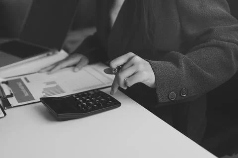 Accountants processing financial documents and taxes, managing corporate fi.. Stockfoto's