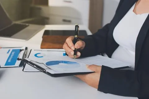 Accountants processing financial documents and taxes, managing corporate fi.. Stockfoto's
