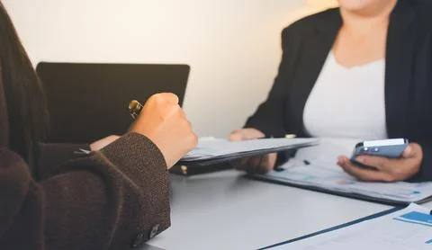 Accountants processing financial documents and taxes, managing corporate fi.. Stock Photos
