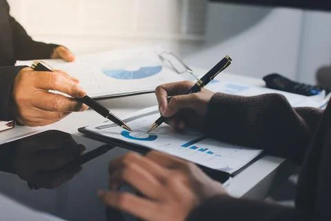 Accountants processing financial documents and taxes, managing corporate fi.. Stock Photos
