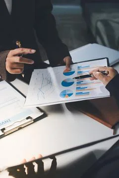 Accountants processing financial documents and taxes, managing corporate fi.. Stockfoto's