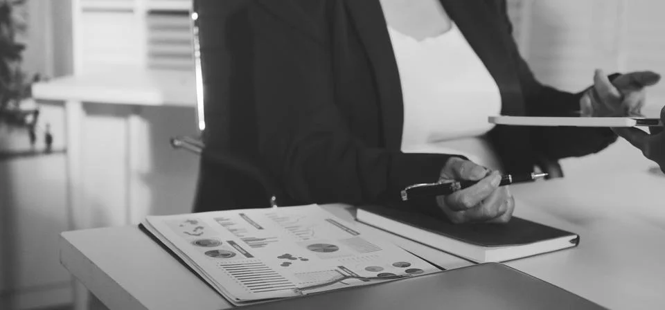 Accountants processing financial documents and taxes, managing corporate fi.. Stock Photos