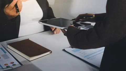 Accountants processing financial documents and taxes, managing corporate fi.. Stock Photos