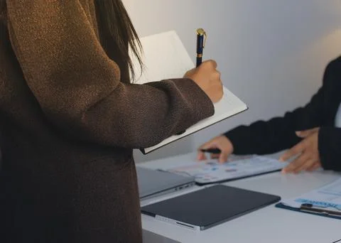Accountants processing financial documents and taxes, managing corporate fi.. Stockfoto's
