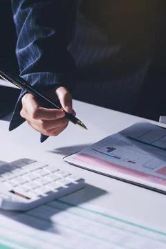 Accountants processing financial documents and taxes, managing corporate fi.. 스톡 사진