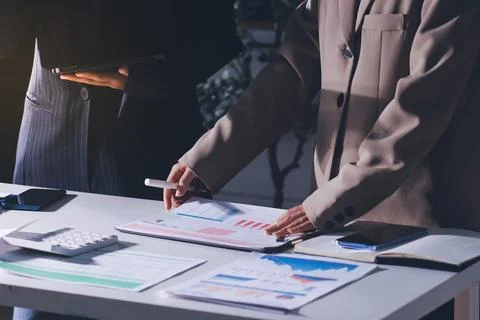 Accountants processing financial documents and taxes, managing corporate fi.. 스톡 사진