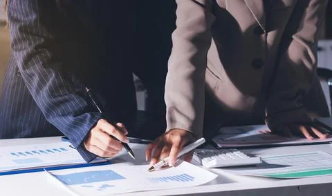 Accountants processing financial documents and taxes, managing corporate fi.. Stockfoto's