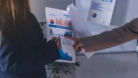 Accountants processing financial documents and taxes, managing corporate fi.. 스톡 사진