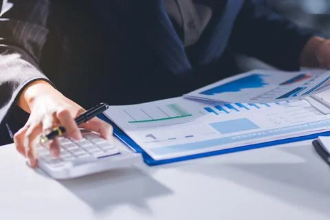 Accountants processing financial documents and taxes, managing corporate fi.. 스톡 사진