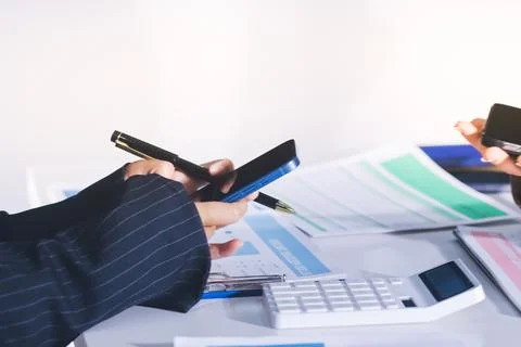 Accountants processing financial documents and taxes, managing corporate fi.. 스톡 사진