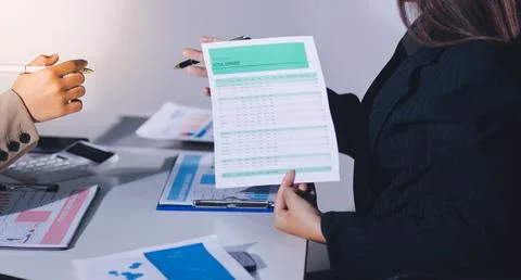 Accountants processing financial documents and taxes, managing corporate fi.. 스톡 사진