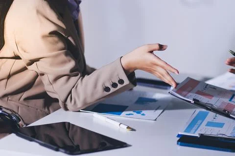 Accountants processing financial documents and taxes, managing corporate fi.. 写真素材