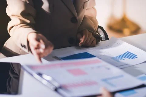 Accountants processing financial documents and taxes, managing corporate fi.. 스톡 사진