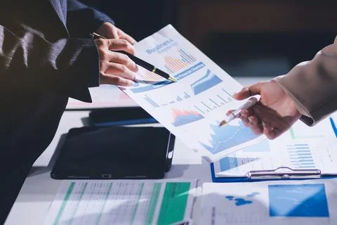 Accountants processing financial documents and taxes, managing corporate fi.. 스톡 사진