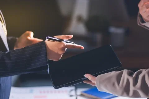 Accountants processing financial documents and taxes, managing corporate fi.. 스톡 사진