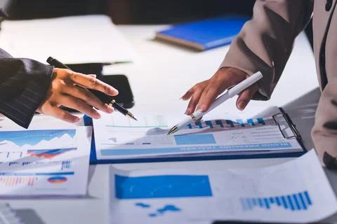 Accountants processing financial documents and taxes, managing corporate fi.. 스톡 사진