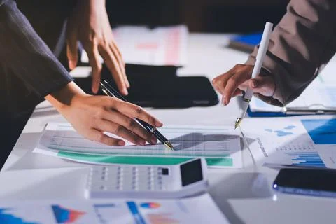 Accountants processing financial documents and taxes, managing corporate fi.. 스톡 사진