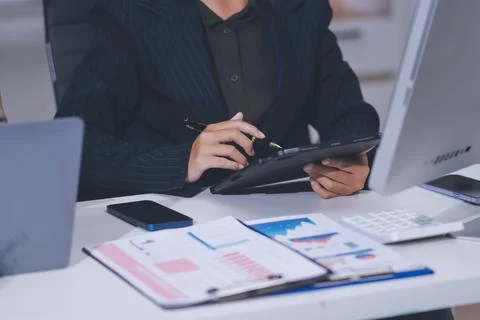 Accountants processing financial documents and taxes, managing corporate fi.. 스톡 사진