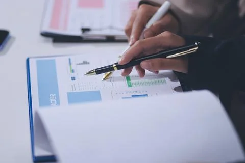 Accountants processing financial documents and taxes, managing corporate fi.. 스톡 사진