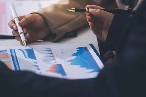 Accountants processing financial documents and taxes, managing corporate fi.. 스톡 사진