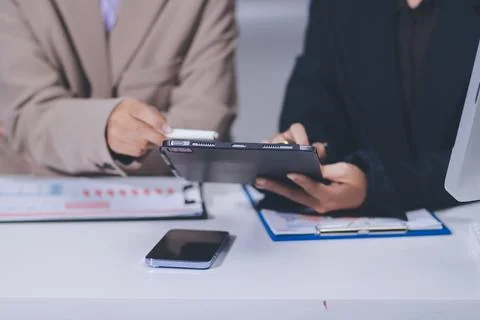 Accountants processing financial documents and taxes, managing corporate fi.. 스톡 사진