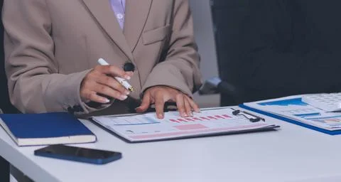 Accountants processing financial documents and taxes, managing corporate fi.. 스톡 사진