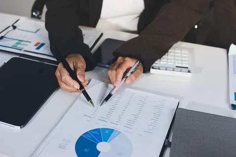 Accountants processing financial documents and taxes, managing corporate fi.. 写真素材