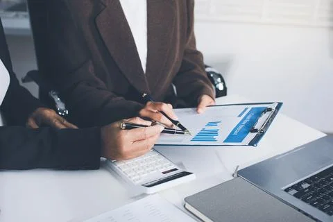 Accountants processing financial documents and taxes, managing corporate fi.. 写真素材