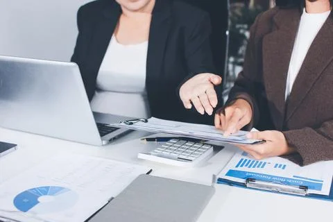 Accountants processing financial documents and taxes, managing corporate fi.. 写真素材