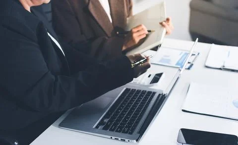 Accountants processing financial documents and taxes, managing corporate fi.. 写真素材