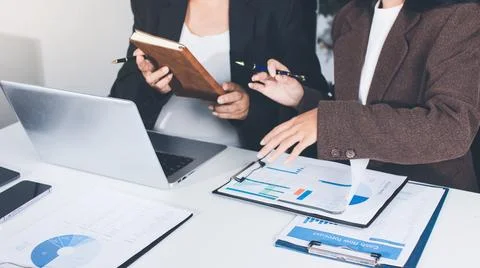 Accountants processing financial documents and taxes, managing corporate fi.. 写真素材