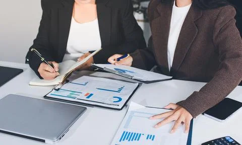 Accountants processing financial documents and taxes, managing corporate fi.. Stock Photos