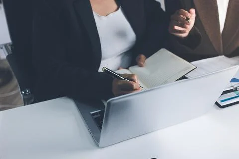 Accountants processing financial documents and taxes, managing corporate fi.. 写真素材