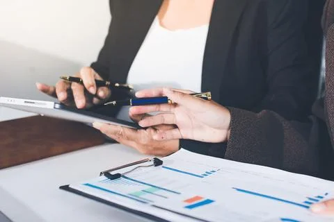 Accountants processing financial documents and taxes, managing corporate fi.. Stock Photos