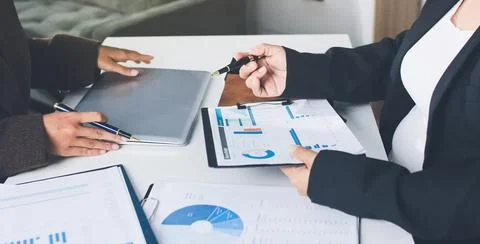 Accountants processing financial documents and taxes, managing corporate fi.. 写真素材