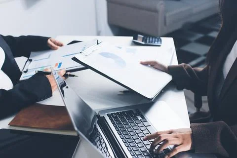 Accountants processing financial documents and taxes, managing corporate fi.. 写真素材