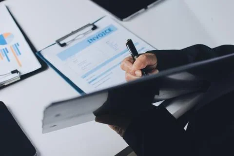 Accountants processing financial documents and taxes, managing corporate fi.. 写真素材