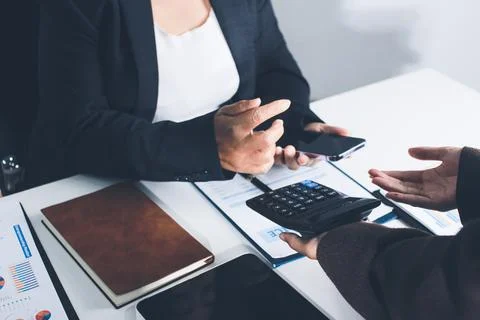 Accountants processing financial documents and taxes, managing corporate fi.. 写真素材