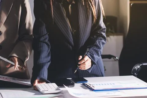 Accountants processing financial documents and taxes, managing corporate fi.. Stock Photos