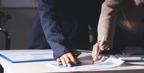 Accountants processing financial documents and taxes, managing corporate fi.. Stock Photos