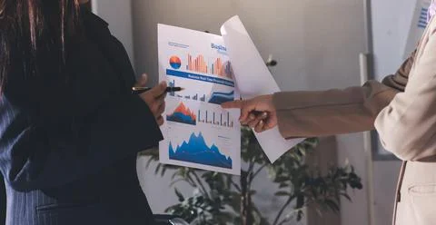 Accountants processing financial documents and taxes, managing corporate fi.. Stock Photos