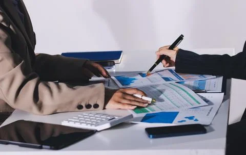 Accountants processing financial documents and taxes, managing corporate fi.. Stock Photos