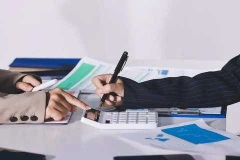 Accountants processing financial documents and taxes, managing corporate fi.. Stock Photos