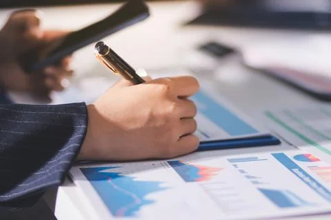 Accountants processing financial documents and taxes, managing corporate fi.. Stock Photos