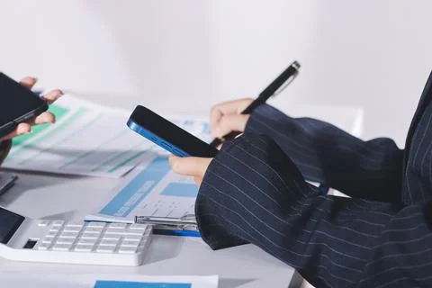 Accountants processing financial documents and taxes, managing corporate fi.. Stock Photos