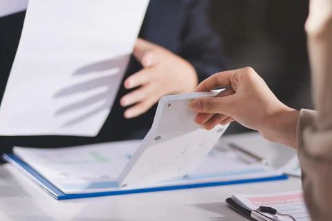 Accountants processing financial documents and taxes, managing corporate fi.. Stock Photos