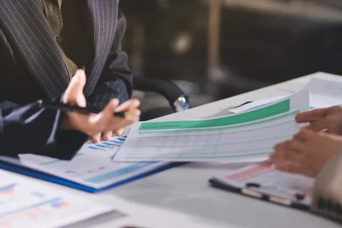 Accountants processing financial documents and taxes, managing corporate fi.. Stock Photos